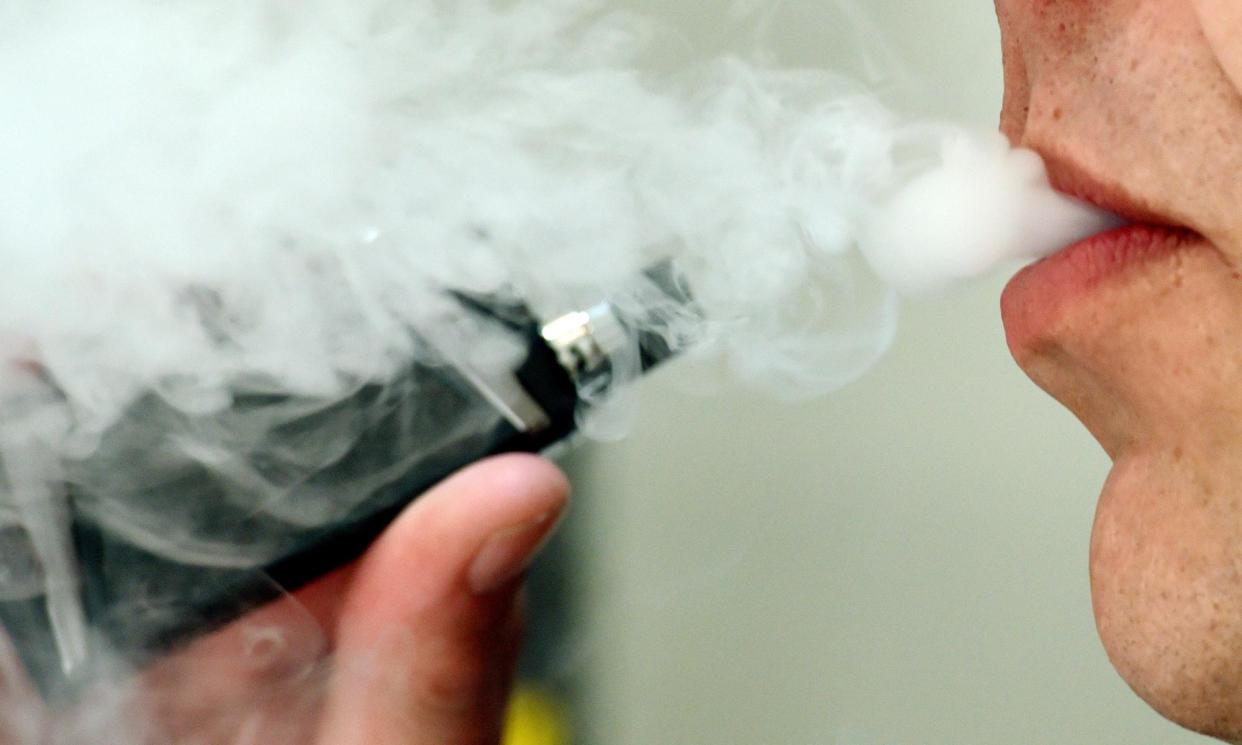 <span>Vapers are inhaling volatile carbonyls and, given there are so many flavours available, research into toxicity levels is difficult.</span><span>Photograph: Nicholas.T Ansell/PA</span>