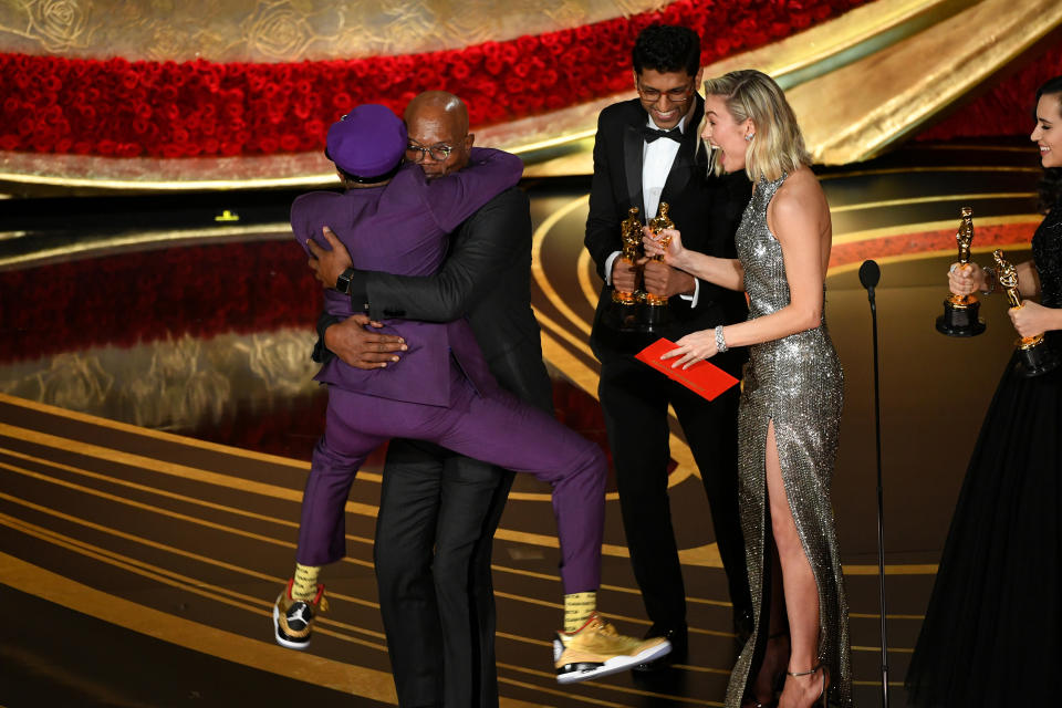 HOLLYWOOD, CALIFORNIA - FEBRUARY 24: (L-R) Spike Lee accepts the Adapted Screenplay award for "BlacKkKlansman" from Samuel L. Jackson and Brie Larson onstage during the 91st Annual Academy Awards at Dolby Theatre on February 24, 2019 in Hollywood, California. (Photo by Kevin Winter/Getty Images)