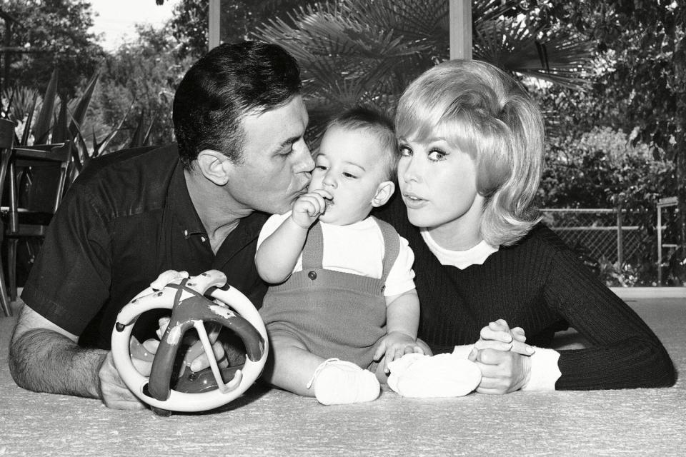 Michael Ansara is shown at home with wife Barbara Eden and their son Matthew