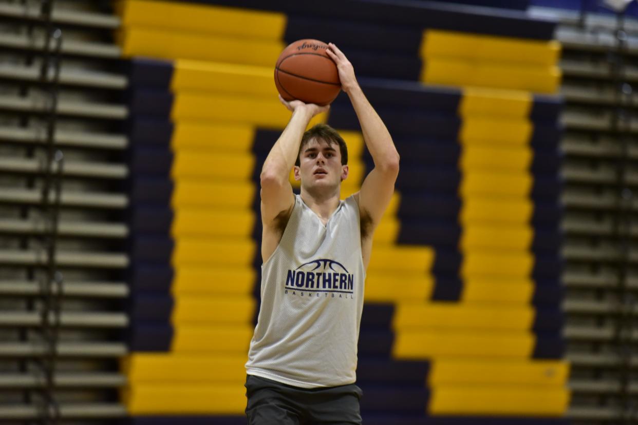 Port Huron Northern's Tyler Jamison works on his jump shot during practice at Port Huron Northern High School on Tuesday. He averaged 29.0 points and 12.3 rebounds per game while leading the Huskies to a 15-6 record last season.