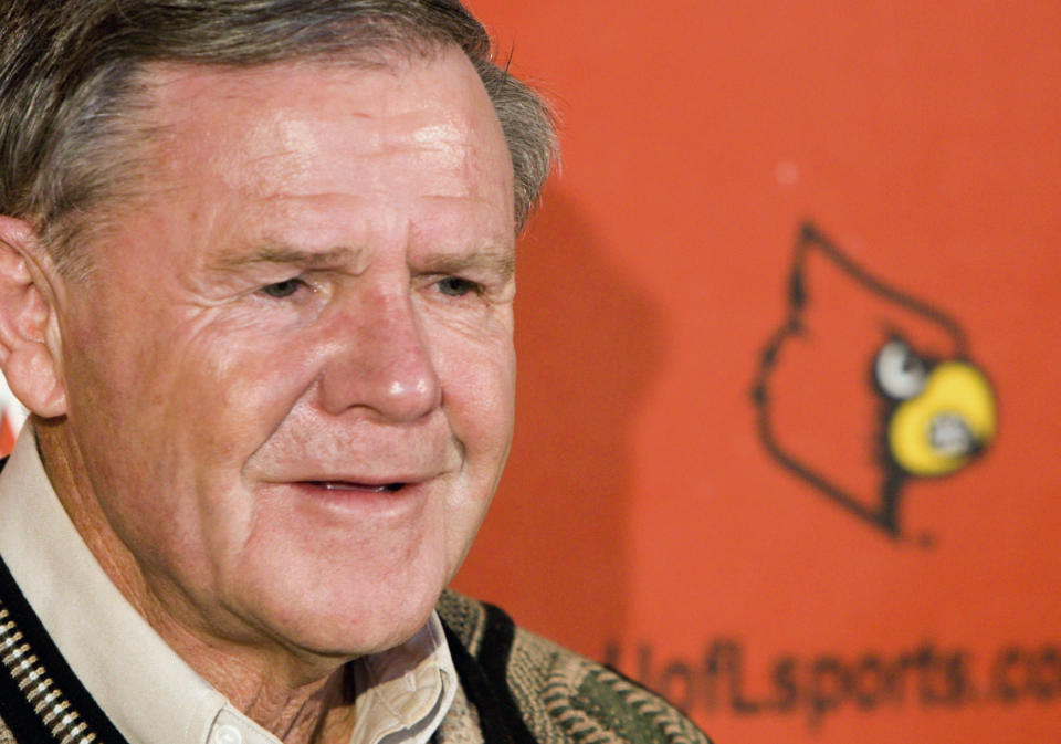 FILE - Former Louisville NCAA college basketball coach Denny Crum speaks during a news conference about the renaming of the floor at Freedom Hall to "Denny Crum Court," Wednesday, Jan. 24, 2007, in Louisville, Ky. Denny Crum, who won two NCAA men’s basketball championships and built Louisville into one of the 1980s’ dominant programs during a Hall of Fame coaching career, died Tuesday, May 9, 2023. He was 86. (David Harpe/Courier Journal via AP, File)