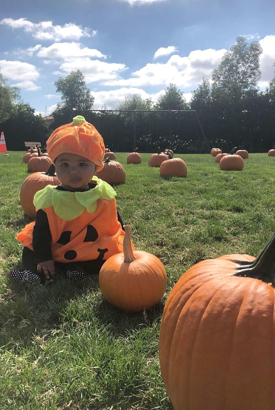 True fit right in during her first <a href="https://people.com/parents/kourtney-kardashian-shares-photo-true-dressed-pumpkin/" rel="nofollow noopener" target="_blank" data-ylk="slk:family trip to a pumpkin patch;elm:context_link;itc:0;sec:content-canvas" class="link ">family trip to a pumpkin patch</a>. Kourtney Kardashian shared a photo of her niece's first Halloween costume — of which a grateful Khloé promised "More costumes to come lol God thank YOU! She's just perfect to me." 