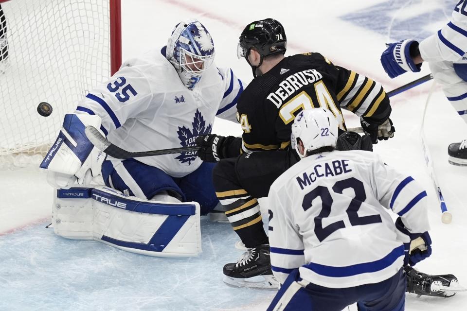 Boston Bruins' Jake DeBrusk (74) scores against Toronto Maple Leafs' Ilya Samsonov (35) during the second period in Game 1 of an NHL hockey Stanley Cup first-round playoff series Saturday, April 20, 2024, in Boston. (AP Photo/Michael Dwyer)