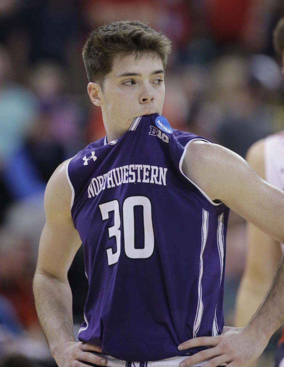 Northwestern guard Bryant McIntosh (30) looks on during the second half of a second-round college basketball game against Gonzaga in the men's NCAA Tournament Saturday, March 18, 2017, in Salt Lake City. (AP Photo/Rick Bowmer)