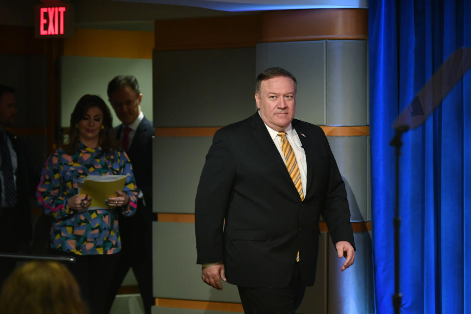 Secretary of State Mike Pompeo arrives to a press conference at the State Department, Wednesday, June 24, 2020 in Washington, followed by State Department spokeswoman Morgan Ortagus and State Department Coordinator for Counterterrorism, Ambassador Nathan Sales. (Mandel Ngan/Pool via AP)