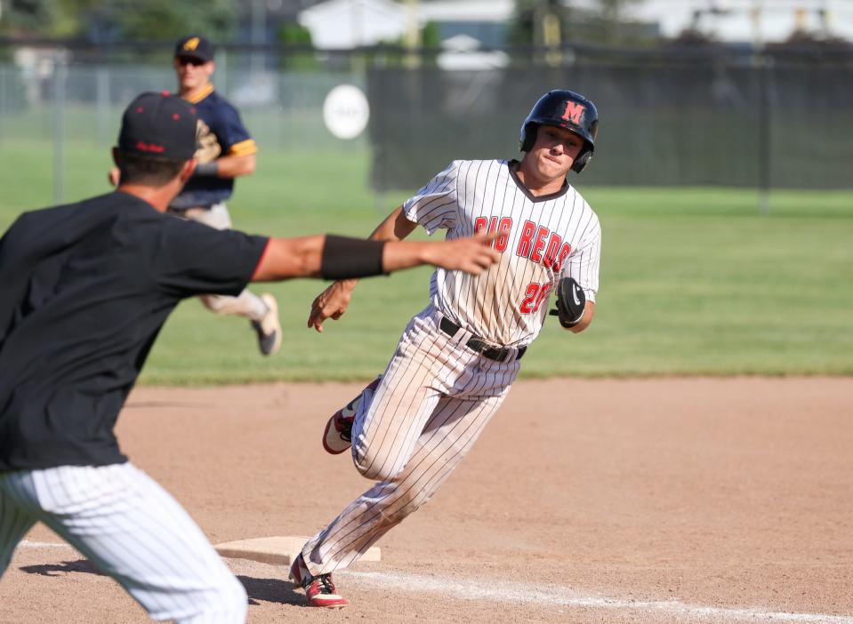 Milan's KJ DeMars is waved home during a 13-4 loss to Airport on Wednesday, May 22, 2024.