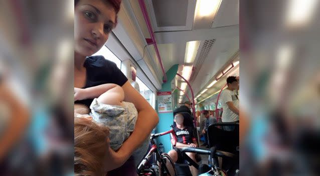 Bryony Esther shared a breastfeeding selfie to Facebook after she was forced to feed her child standing on a packed train. Photo: Facebook