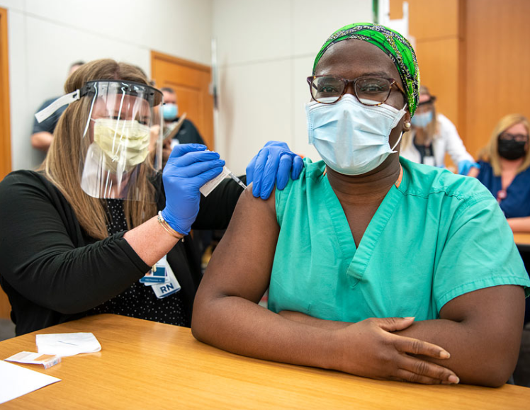 Frontline workers at Ohio State University's Wexner Medical Center become among the first in the nation to receive the Pfizer COVID vaccine on Dec. 14, 2020, just three days after approved for emergency use by the federal Food and Drug Administration.