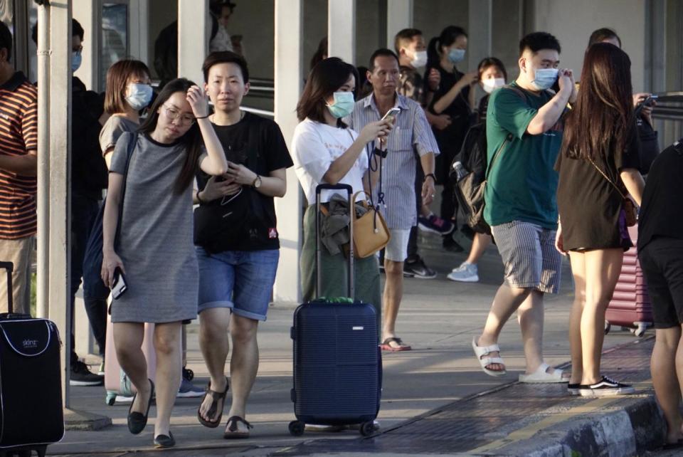 People arriving at Woodlands Checkpoint on 17 March, 2020. (PHOTO: Dhany Osman/Yahoo News Singapore)