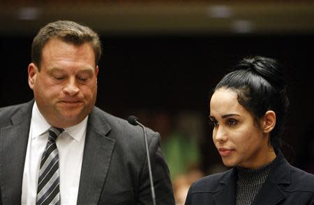 Nadya Suleman appears with her attorney Arthur J. La Cilento (L) for arraignment in Los Angeles, California January 17, 2014. REUTERS/Al Seib/Pool