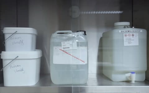 Containers of embalming fluid at the AMC