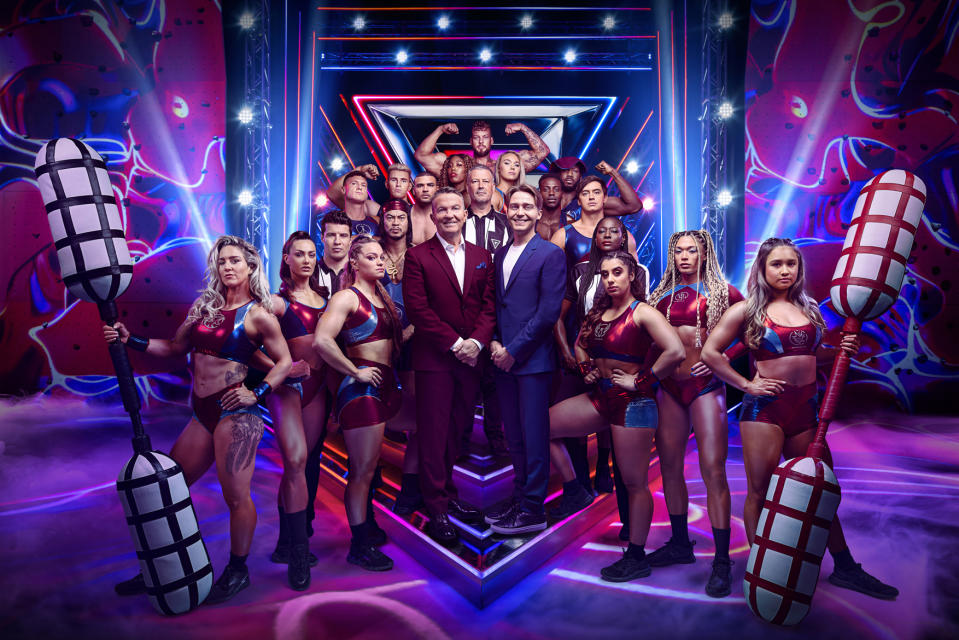 Gladiators, BOTTOM ROW: (L-R) SABRA, KOMETA, LEE PHILLIPS, FURY, BRADLEY WALSH, BARNEY WALSH, SONYA MCOLOMA, ATHINA, ELEKTRO, DYNAMITE.  MIDDLE ROW: (LR) LEGEND, BIONIC, STEEL, FIRE, MARK CLATENBERG, DIAMOND, NITRO, PHANTOM, APOLLO.  ABOVE: GIANT, © Hungry Bear Media Ltd, Nick Eagle