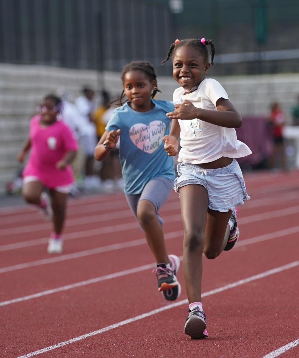 Athletes come from across the region to competes in the inaugural Memorial Stadium Twilight Track & Field Series in Mount Vernon on Thursday, July 27, 2023.