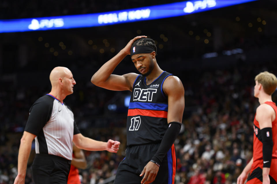 Detroit Pistons guard Stanley Umude (17) reacts during the second half of an NBA basketball game against the Toronto Raptors, in Toronto, Sunday, Nov. 19, 2023. (Christopher Katsarov/The Canadian Press via AP)