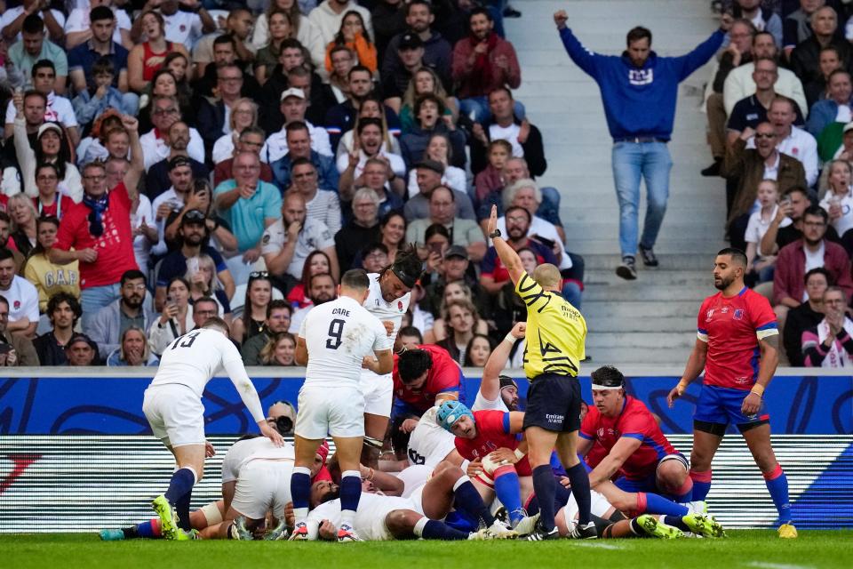 Theo Dan scores England’s second try of the game (AP)