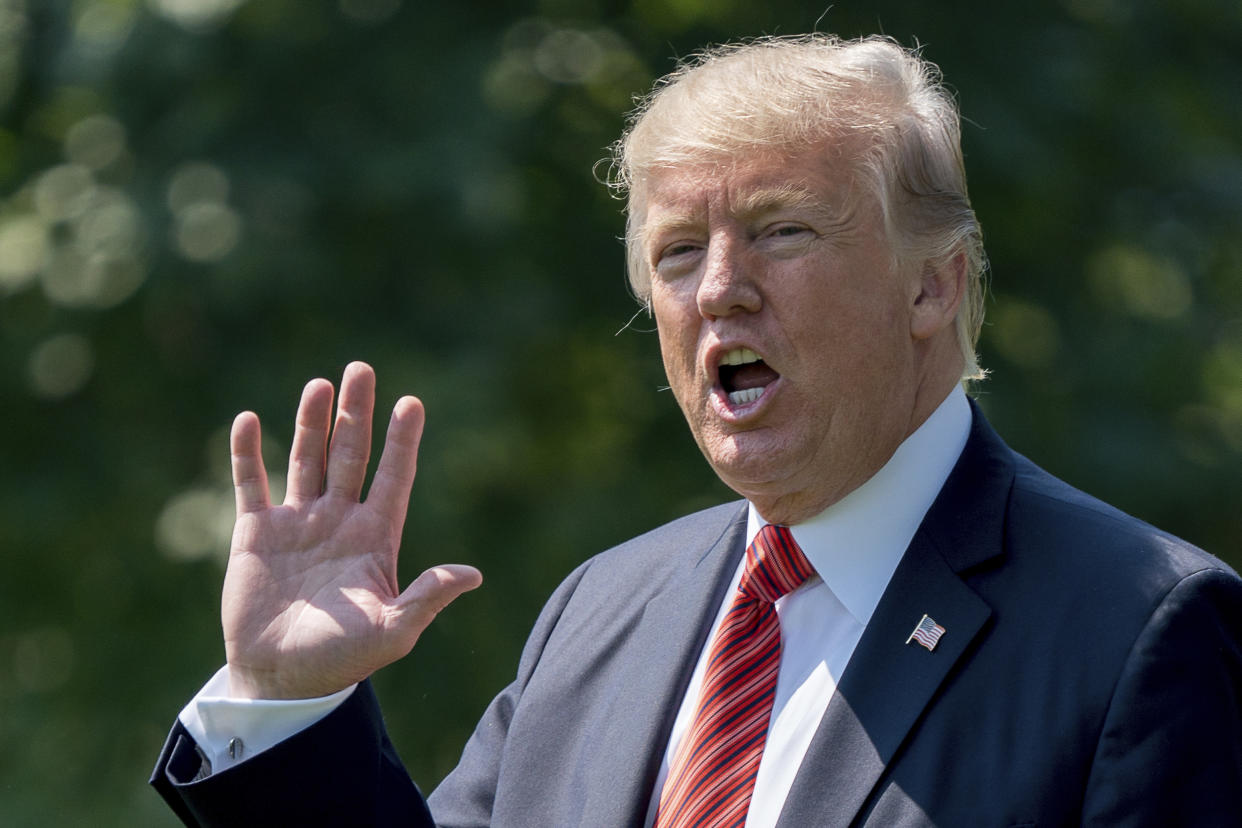 President Donald Trump waves as he walks across the South Lawn to board Marine One at the White House in Washington, Tuesday, Aug. 22, 2017, for a short trip to Andrews Air Force Base, Md. and then onto Yuma, Ariz. to visit the U.S. border with Mexico and attend a rally in Phoenix. (AP Photo/Andrew Harnik)