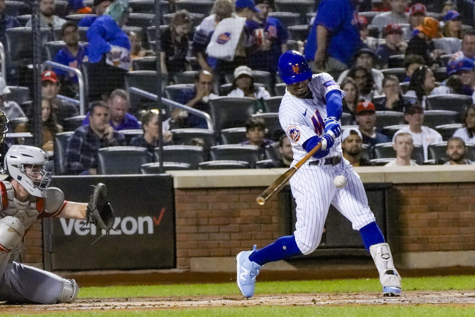 New York Mets' Francisco Lindor singles during the first inning of a baseball game against the Cincinnati Reds, Saturday, Sept. 16, 2023, in New York. (AP Photo/Bebeto Matthews)