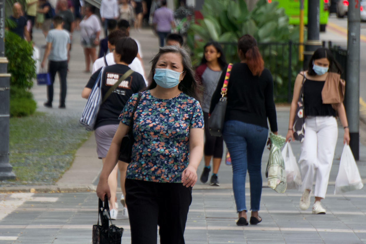 People seen wearing face masks along Orchard Road on 9 February 2020. (PHOTO: Dhany Osman / Yahoo News Singapore)