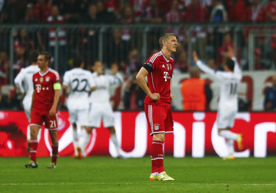 Bayern Munich's Schweinsteiger reacts after the third goal scored by Real Madrid during their Champions League semi-final second leg soccer match in Munich