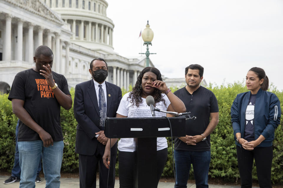 In this Aug. 3, 2021, photo, from left, Rep. Mondaire Jones, D-N.Y., Rep. Al Green, D-Texas, Rep. Cori Bush, D-Mo., Rep. Jimmy Gomez, D-Calif., and Rep. Alexandria Ocasio-Cortez, D-N.Y., after it was announced that the Biden administration will enact a targeted nationwide eviction moratorium outside of Capitol Hill in Washington. The rare clash this week between the Biden administration and congressional Democrats over a lapsed eviction moratorium could become a blueprint for even larger fights that lie ahead. (AP Photo/Amanda Andrade-Rhoades)