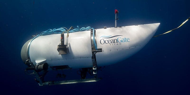 A side view of the Titan submersible in water.