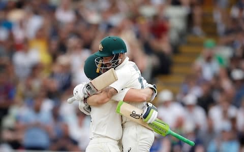 Matthew Wade of Australia celebrates with Tim Paine after reaching his century  - Credit: GETTY IMAGES