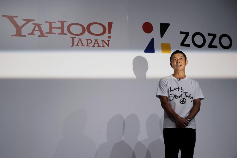 Zozo founder Yusaku Maezawa speaks during a news conference Thursday, Sept. 12, 2019, in Tokyo. Yahoo Japan Corp. is putting up a tender offer, estimated at 400 billion yen ($3.7 billion), for Zozo Inc., a Japanese online retailer started by the celebrity tycoon. (AP Photo/Jae C. Hong)
