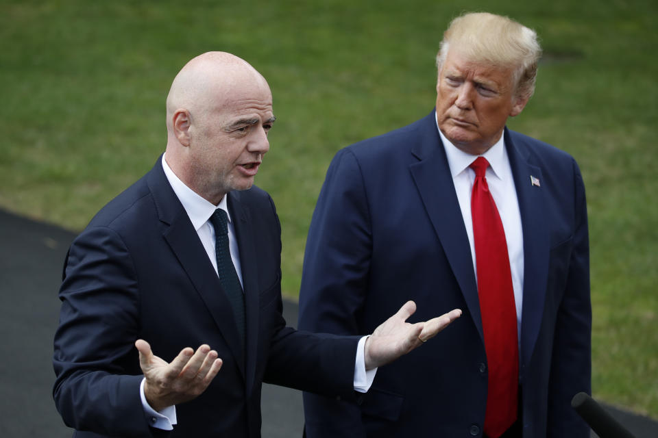 FIFA president Gianni Infantino speaks as President Donald Trump listens on the South Lawn of the White House, Monday, Sept. 9, 2019, in Washington. (AP Photo/Alex Brandon)