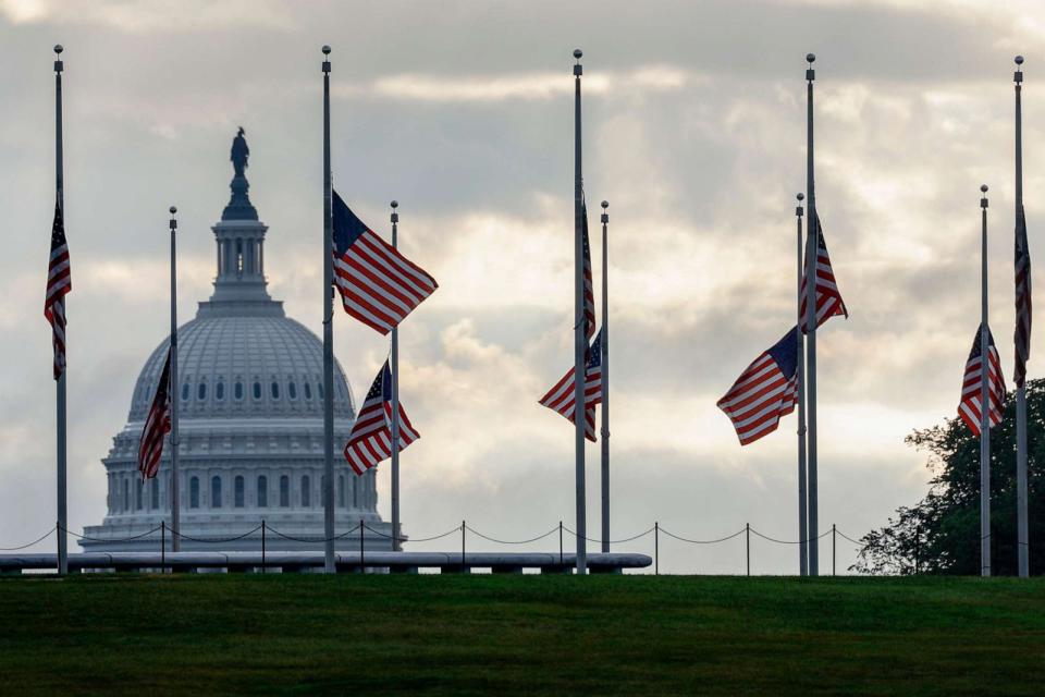 PHOTO: American flags fly at half staff around the Washington Monument on the National Mall to mark the 22nd anniversary of the terror attacks on Sept. 11, 2023 in Washington. (Anna Moneymaker/Getty Images)