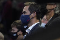 Tennis great Roger Federer watches the Laver Cup presentation from court side after Team Europe defeated Team World in Laver Cup tennis, Sunday, Sept. 26, 2021, in Boston. (AP Photo/Elise Amendola)