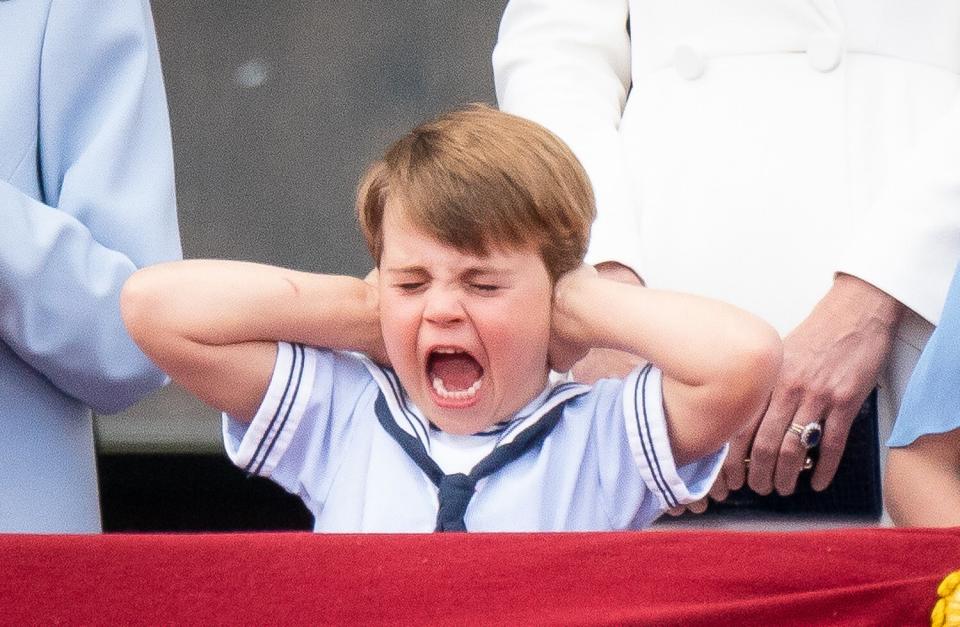 Prince Louis pulls a face on the balcony of Buckingham Palace, to view the Platinum Jubilee flypast, on day one of the Platinum Jubilee celebrations