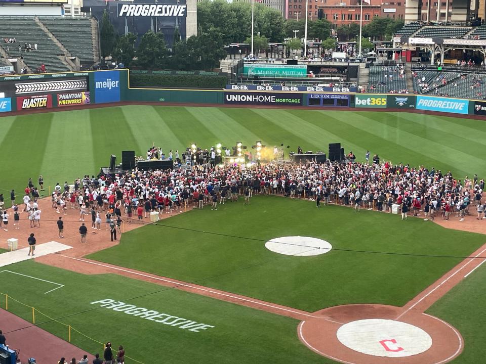 A view from the press box as fans dance on the infield while Shaquille O'Neal performs as "DJ Diesel" after the Cleveland Guardians defeated the Toronto Blue Jays 6-3 on Saturday, June 22, at Progressive Field.