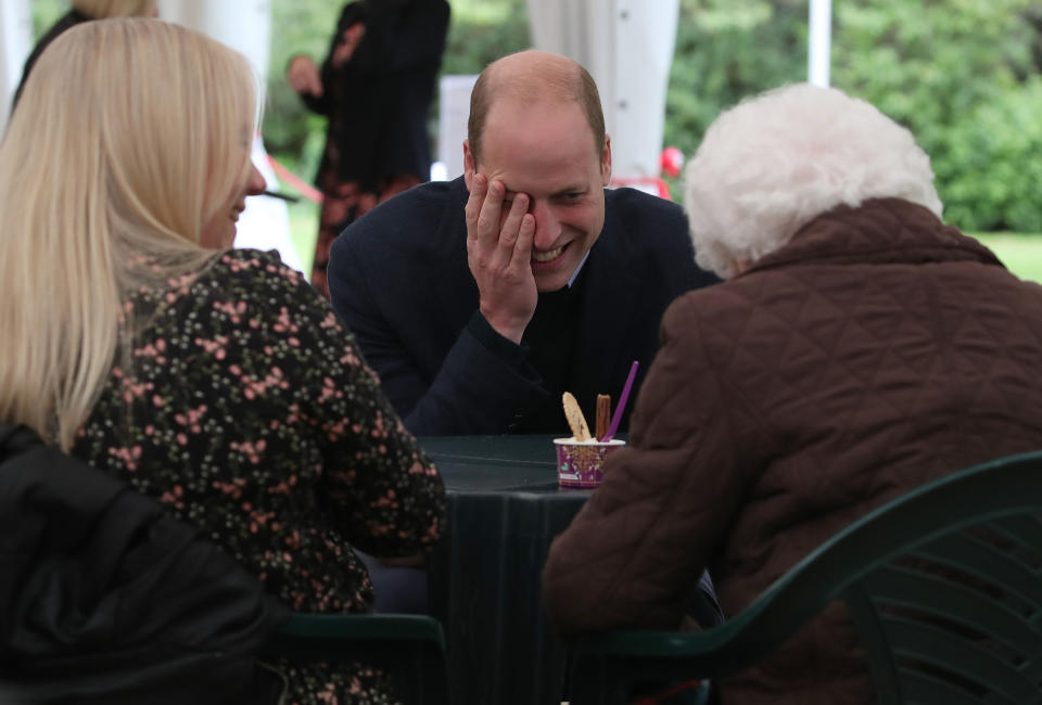 Prince William chats with Betty Magee and her granddaughter, Kimberley Anderson, during a visit to the Queens Bay Lodge Care Home on May 23 in Edinburgh, Scotland. (Photo: WPA Pool via Getty Images)