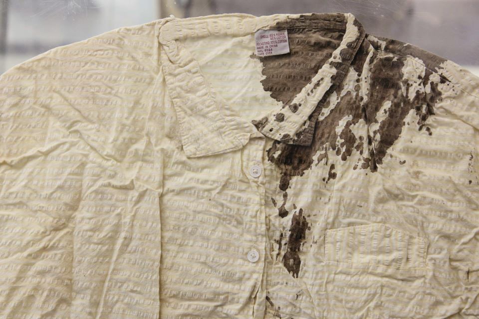 A blood-soaked shirt of reporter Jiang Lin who was beaten by armed police at Tiananmen square is displayed at the June 4th Memorial Exhibit on Thursday, June 1, 2023, in New York. An exhibit will open Friday, June 2, 2023, in New York, ahead of the June 4 anniversary of the violence that ended China's 1989 Tiananmen protests. (AP Photo/Andres Kudacki)