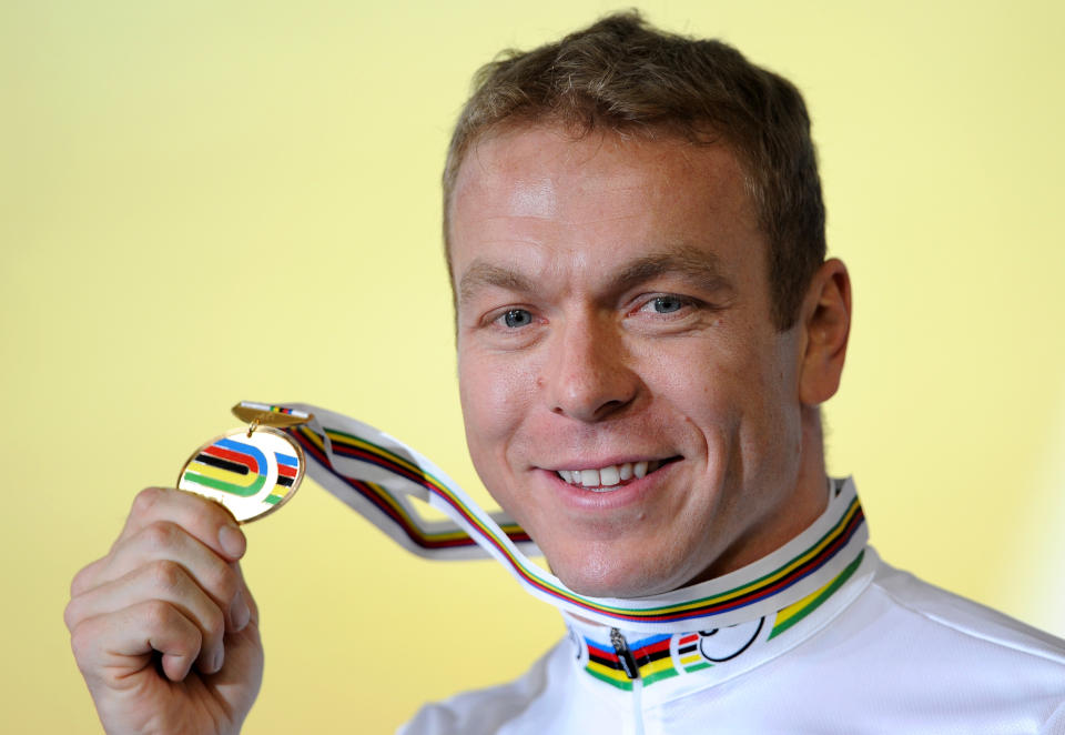 Chris Hoy of Britain poses with his gold medal after winning the men's keirin at the 2012 Track Cycling World Championships in Melbourne, on April 8, 2012.  IMAGE STRICTLY RESTRICTED TO EDITORIAL USE - STRICTLY NO COMMERCIAL USE  AFP PHOTO/William WEST (Photo credit should read WILLIAM WEST/AFP/Getty Images)