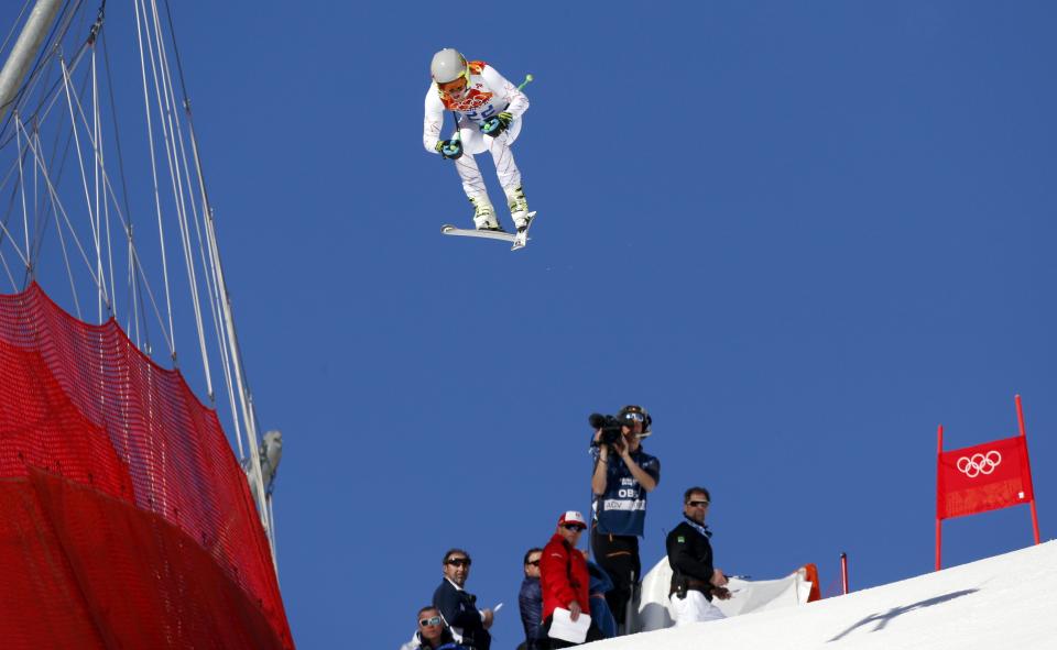 Ted Ligety of the U.S. competes in the downhill run of the men's alpine skiing super combined event at the 2014 Sochi Winter Olympics, February 14, 2014. REUTERS/Stefano Rellandini