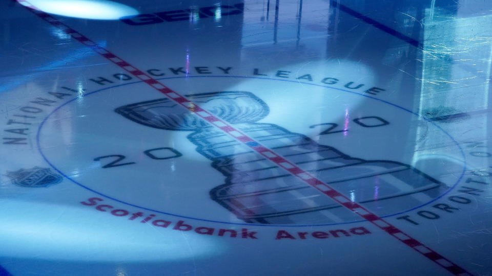 TORONTO, ONTARIO - AUGUST 09: A detailed view of the 2020 Stanley Cup logo at center ice in between periods of an Eastern Conference Round Robin game between the Boston Bruins and the Washington Capitals during the 2020 NHL Stanley Cup Playoffs at Scotiabank Arena on August 09, 2020 in Toronto, Ontario, Canada. (Photo by Andre Ringuette/Freestyle Photo/Getty Images)