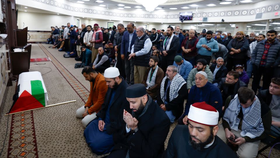 Community members pray during a funeral service for Wadea Al-Fayoume at the Mosque Foundation on October 16, 2023 in Bridgeview, Illinois.  - Kamil Krzaczynski/Getty Images