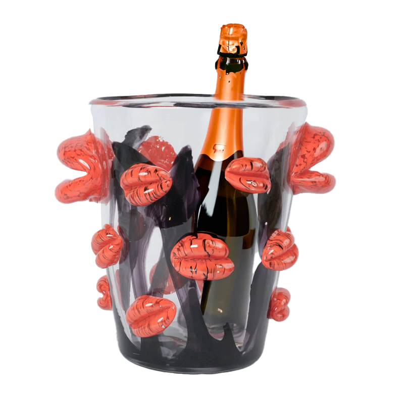 <p><a href="https://go.redirectingat.com?id=74968X1596630&url=https%3A%2F%2Fwww.chezpluie.com%2Fproducts%2Fkiss-me-everywhere-ice-bucket-w-red-blown-glass-lips-by-lea-novaro&sref=https%3A%2F%2Fwww.housebeautiful.com%2Fentertaining%2Ftable-decor%2Fa60619591%2Fhow-tastemakers-set-the-table%2F" rel="nofollow noopener" target="_blank" data-ylk="slk:Shop Now;elm:context_link;itc:0;sec:content-canvas" class="link ">Shop Now</a></p><p>"Kiss Me Everywhere" Ice Bucket</p><p>chezpluie.com</p><p>$2200.00</p>