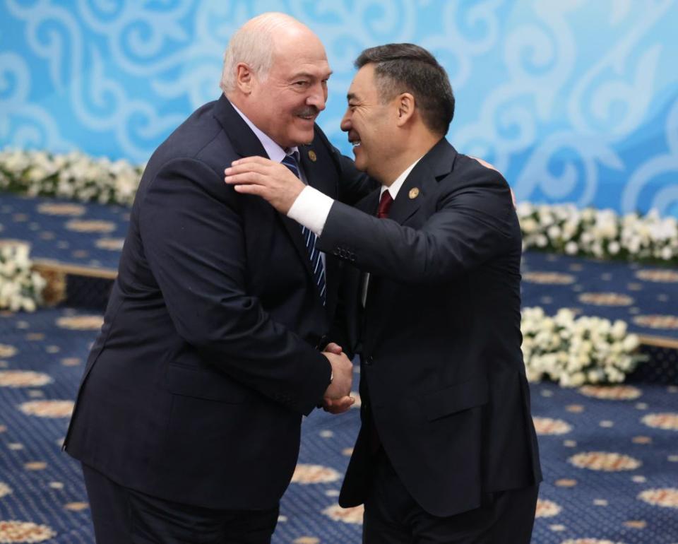 Belarusian dictator Alexander Lukashenko (L) embraces Kyrgyz President Sadyr Japarov (R) during the Commonwealth of Independent States summit in Bishkek, Kyrgyzstan, on Oct. 12, 2023. (Contributor/Getty Images)