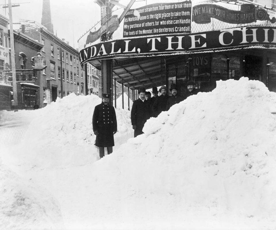 store hidden by heavy snowfall