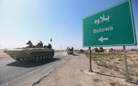 Military vehicles enter Kirkuk - Credit: Stringer/Reuters