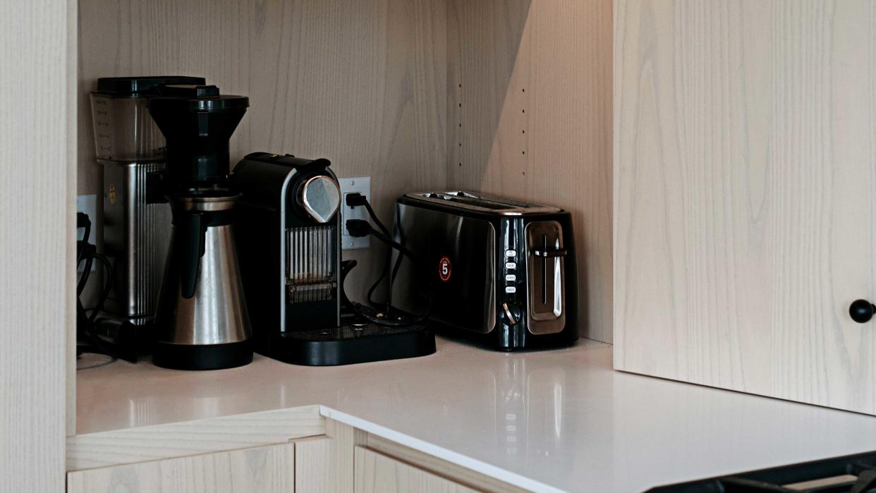  A countertop with appliances on it. 