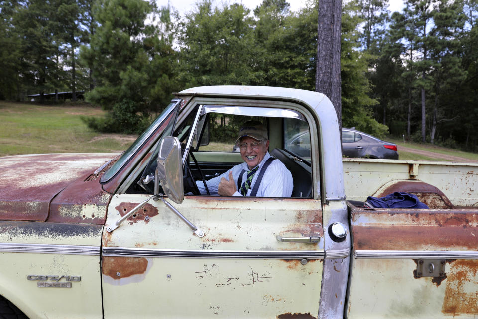 South Carolina state Sen. Mike Fanning, D-Great Falls, gets ready to drive away in "Ole Yella," his 1970 Chevrolet pickup, Saturday, Aug. 5, 2023, in Blair, S.C. In an increasingly Republican state, Fanning hopes the personal touch can help him keep his seat. (AP Photo/Jeffrey Collins)