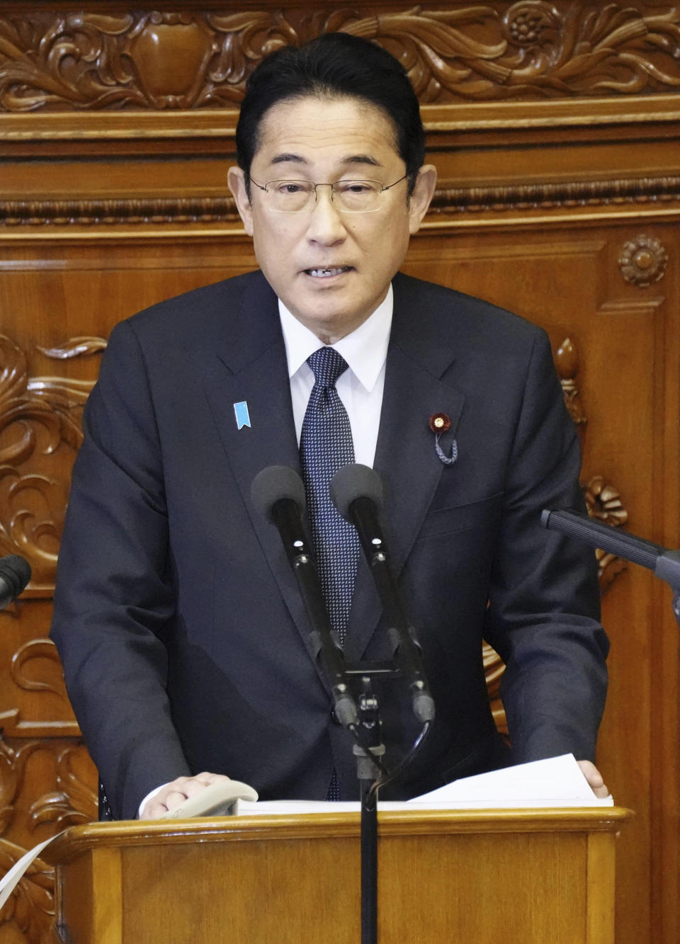 Japan's Prime Minister Fumio Kishida delivers his policy speech during an extraordinary session of the Diet at the parliament in Tokyo Monday, Oct. 23, 2023. (Kyodo News via AP)