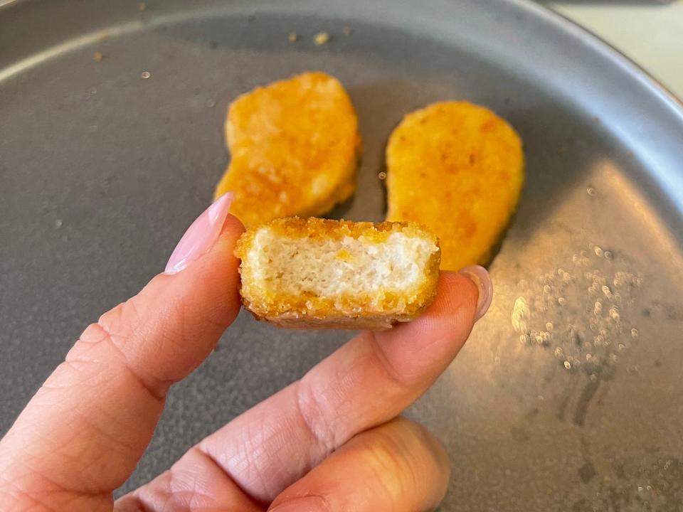 great value chicken nuggets bitten and cooked