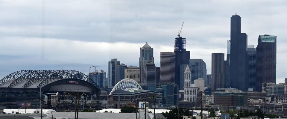 Aug 8, 2019; Seattle, WA, USA; General view of the Seattle downtown skyline and T-Mobile Park and CenturyLink Field.