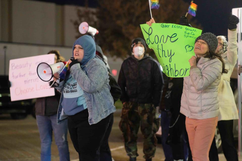 Local supporters launch a counter-protest in support of a Christmas drag show Tuesday outside of the Globe-News Center for the Performing Arts in downtown Amarillo.