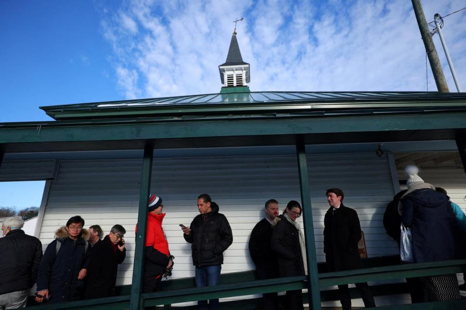 PHOTO: Voters wait in line for a Get Out the Vote campaign rally with Republican presidential candidate and former U.S. Ambassador to the United Nations Nikki Haley ahead of the New Hampshire primary election in Franklin, New Hampshire, January 22, 2024. (Brian Snyder/Reuters)