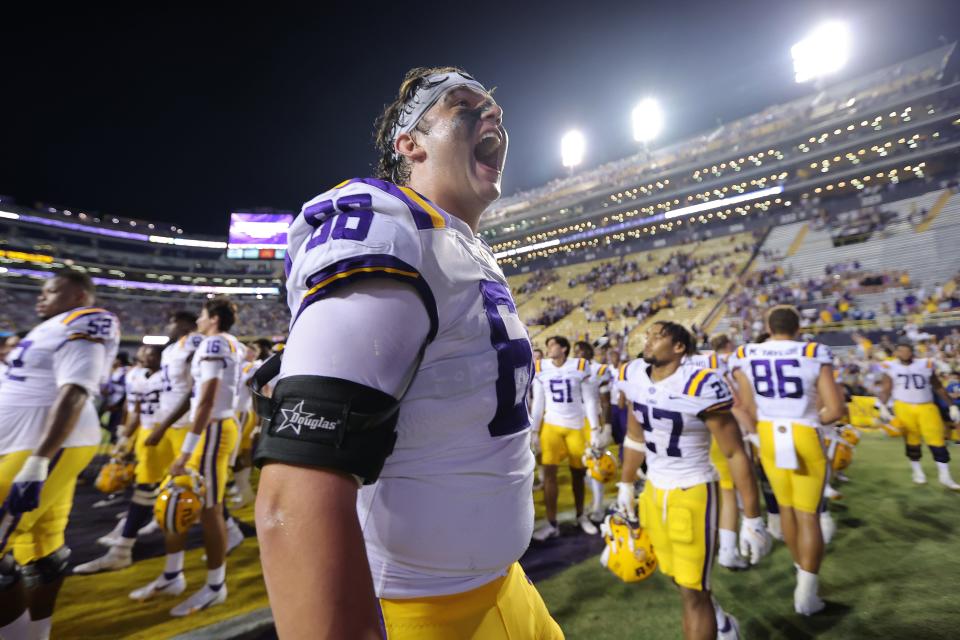 BATON ROUGE, LOUISIANA - SEPTEMBER 17: Will Campbell #66 of the LSU Tigers celebrates after a game at against the Mississippi State Bulldogs Tiger Stadium on September 17, 2022 in Baton Rouge, Louisiana. (Photo by Jonathan Bachman/Getty Images)